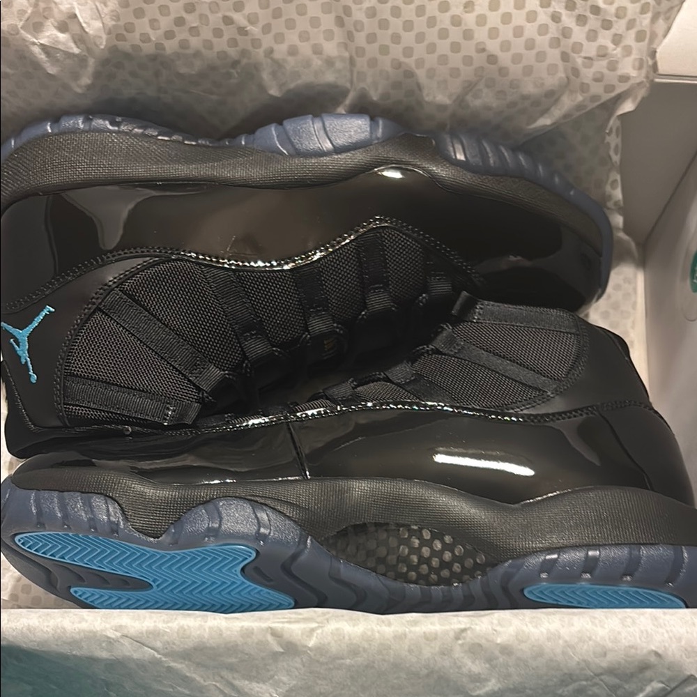 Jordans 11 brand new 
Black and Blue High-Top Sneakers
